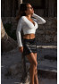 Jupe courte simili cuir noir Paula