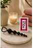 Chapelet Anal Cœur Silicone Noir 1 dosette de lubrifiant — Pocket Pleasure